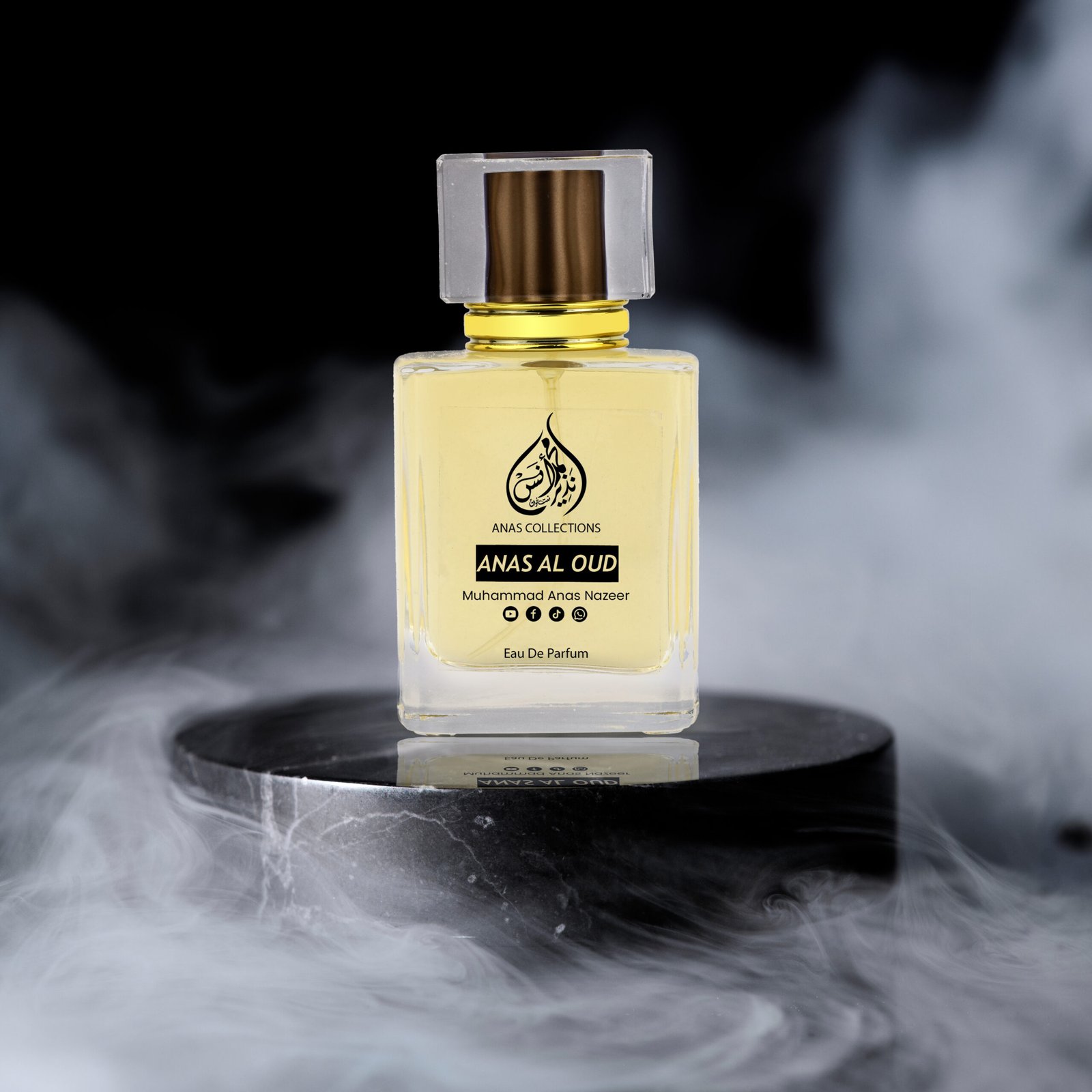 Luxury Anas Al Oud perfume bottle showcased on a black marble pedestal with a smoky background.