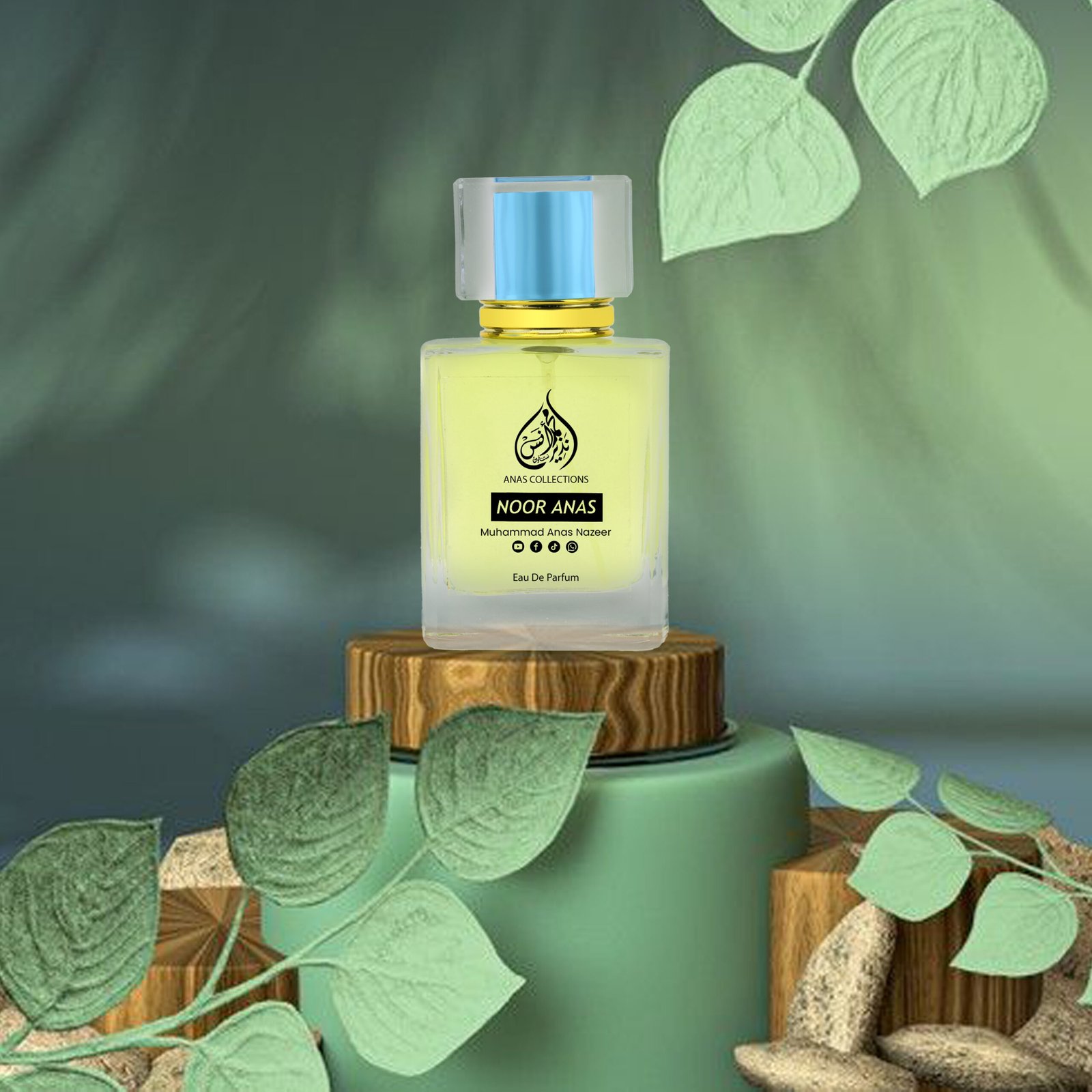 Noor Anas fragrance bottle displayed on a nature-themed wooden podium with green leaves.