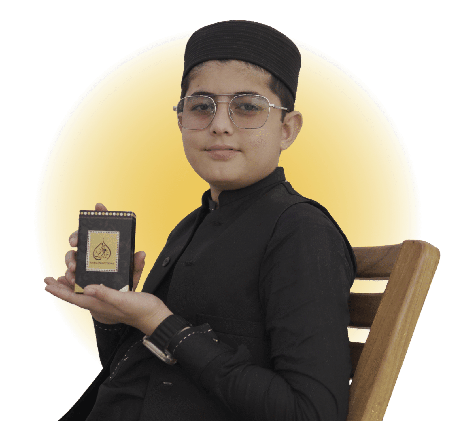 Muhammad Anas Nazeer holding a luxury Arabic perfume bottle - Best long-lasting attars and fragrances in Pakistan by Anas Collectionz
